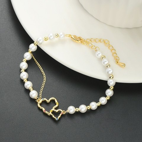 Bransoletka na rękę stal chirurgiczna pozłacana 14k złotem, PEREŁKI SERCA BST1531 Bransoletka na rękę stal chirurgiczna pozłacana 14k złotem, PEREŁKI SERCA BST1531